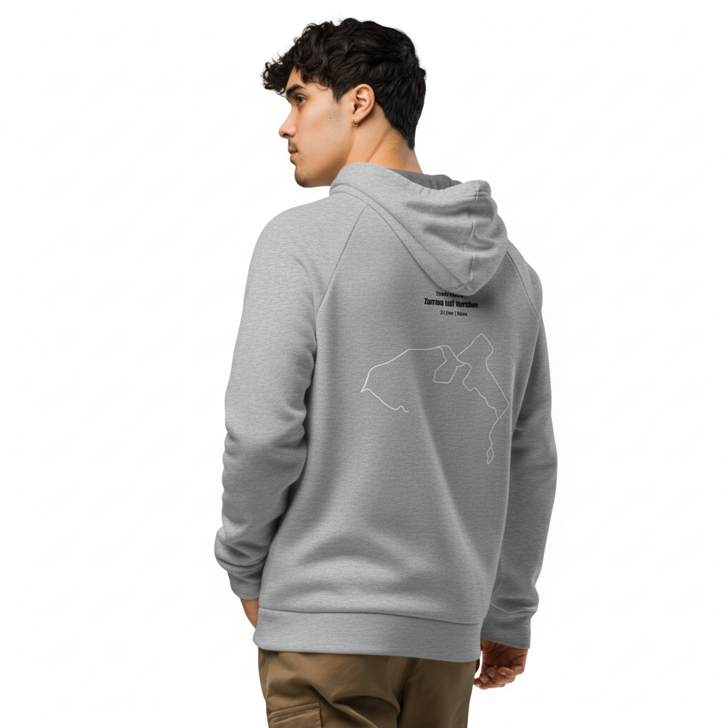 Person wearing a gray hoodie with a logo on the back, standing against a white background