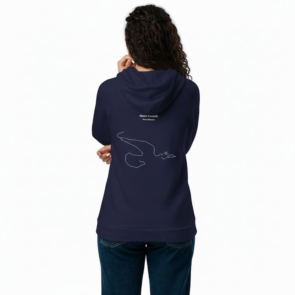 Person wearing a navy blue hoodie with a logo on the back, standing against a white background