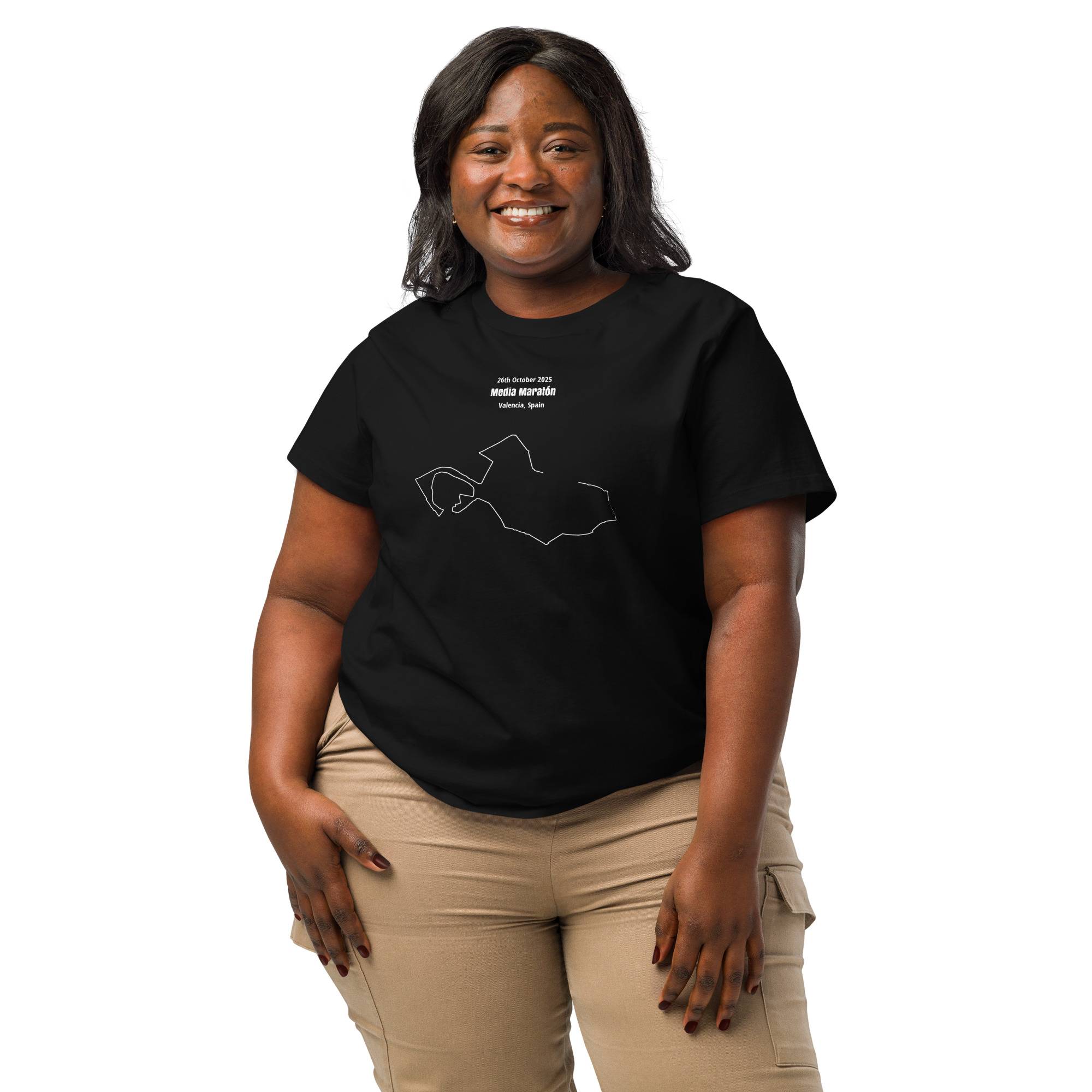 Woman wearing a black t-shirt with a custom Strava route print design on a white background