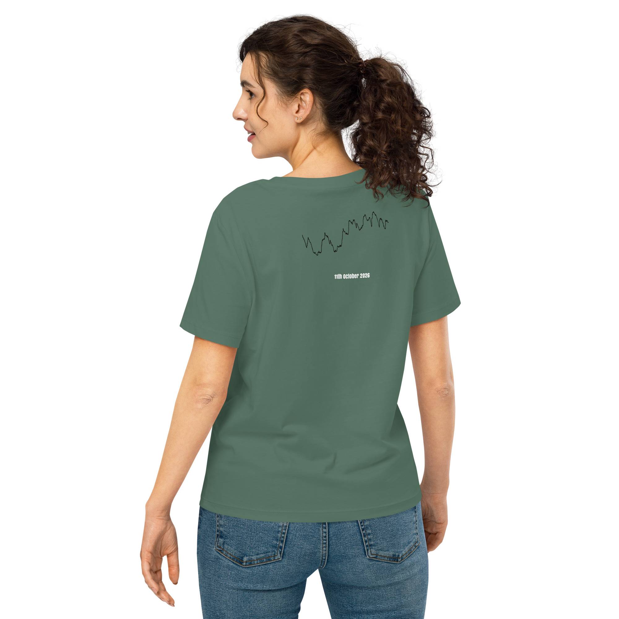 Woman wearing a green t-shirt with a custom Strava route print design on the back, standing against a white background