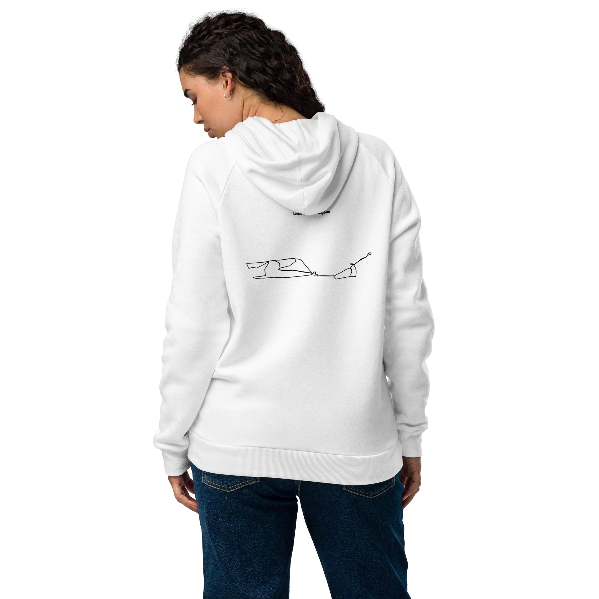 Person wearing a white hoodie with a logo on the back, standing against a white background