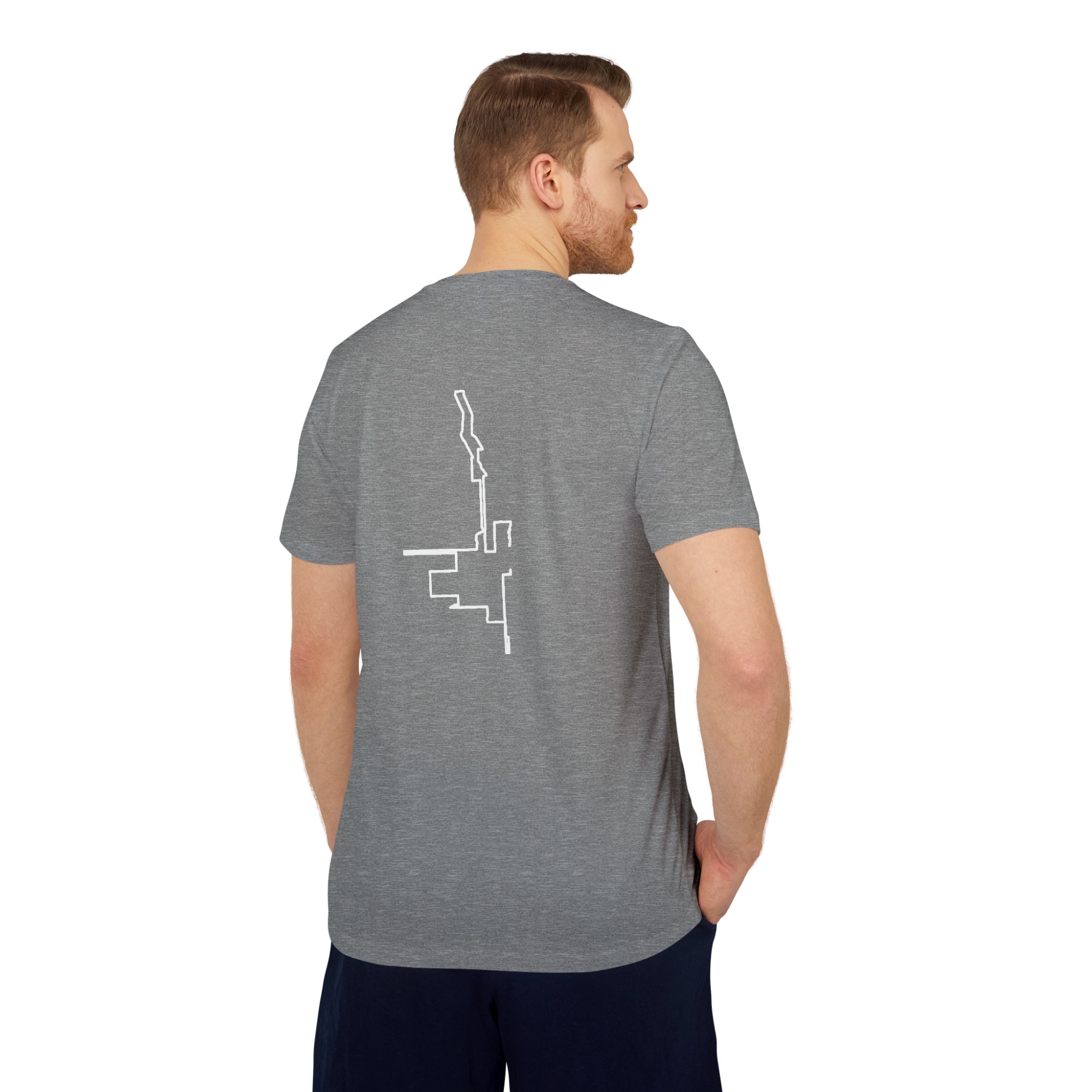 Man wearing a gray t-shirt with a white custom Strava route print art on the back, standing against a white background