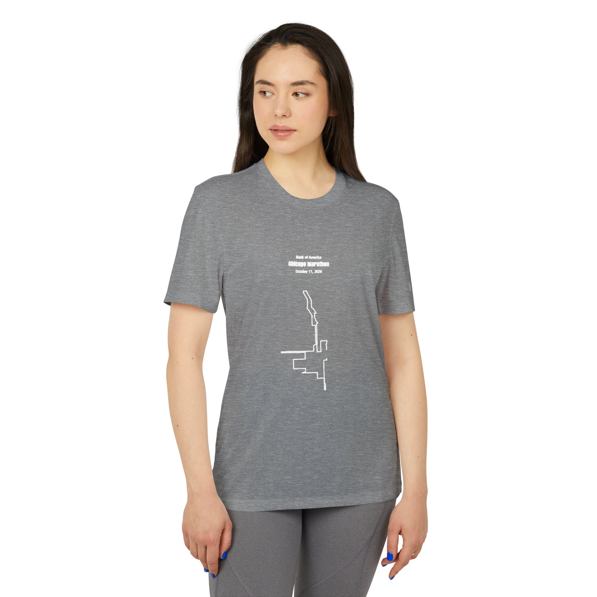 Woman wearing a gray t-shirt with a white custom Strava route print art design on a white background