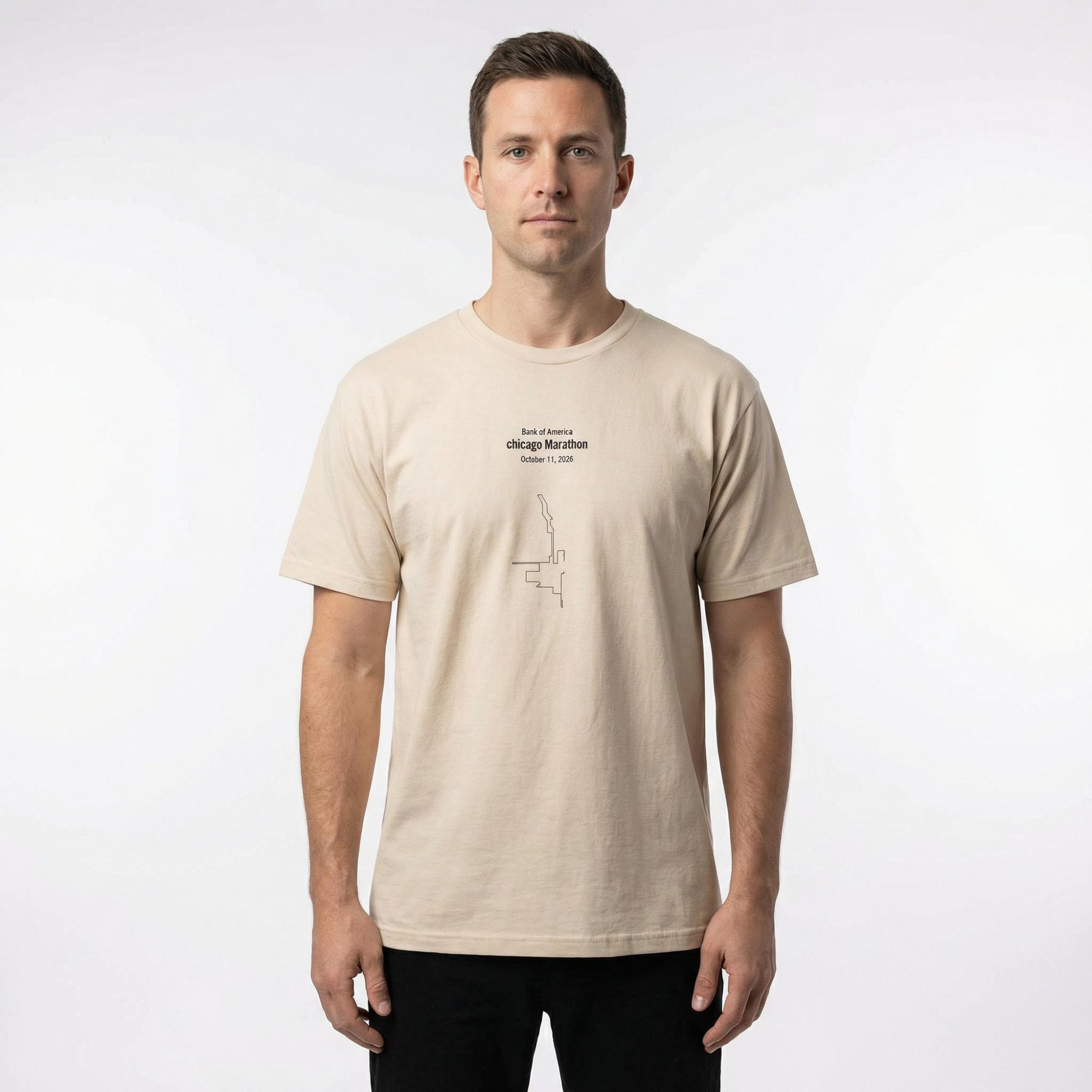 Man wearing a beige t-shirt with text and custom Strava route print art design on a white background