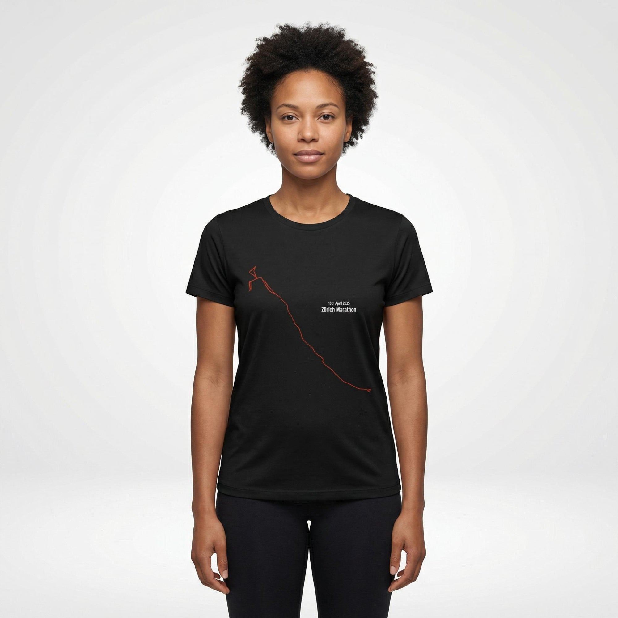 Person wearing a black t-shirt with an orange custom Strava route print art design on a white background