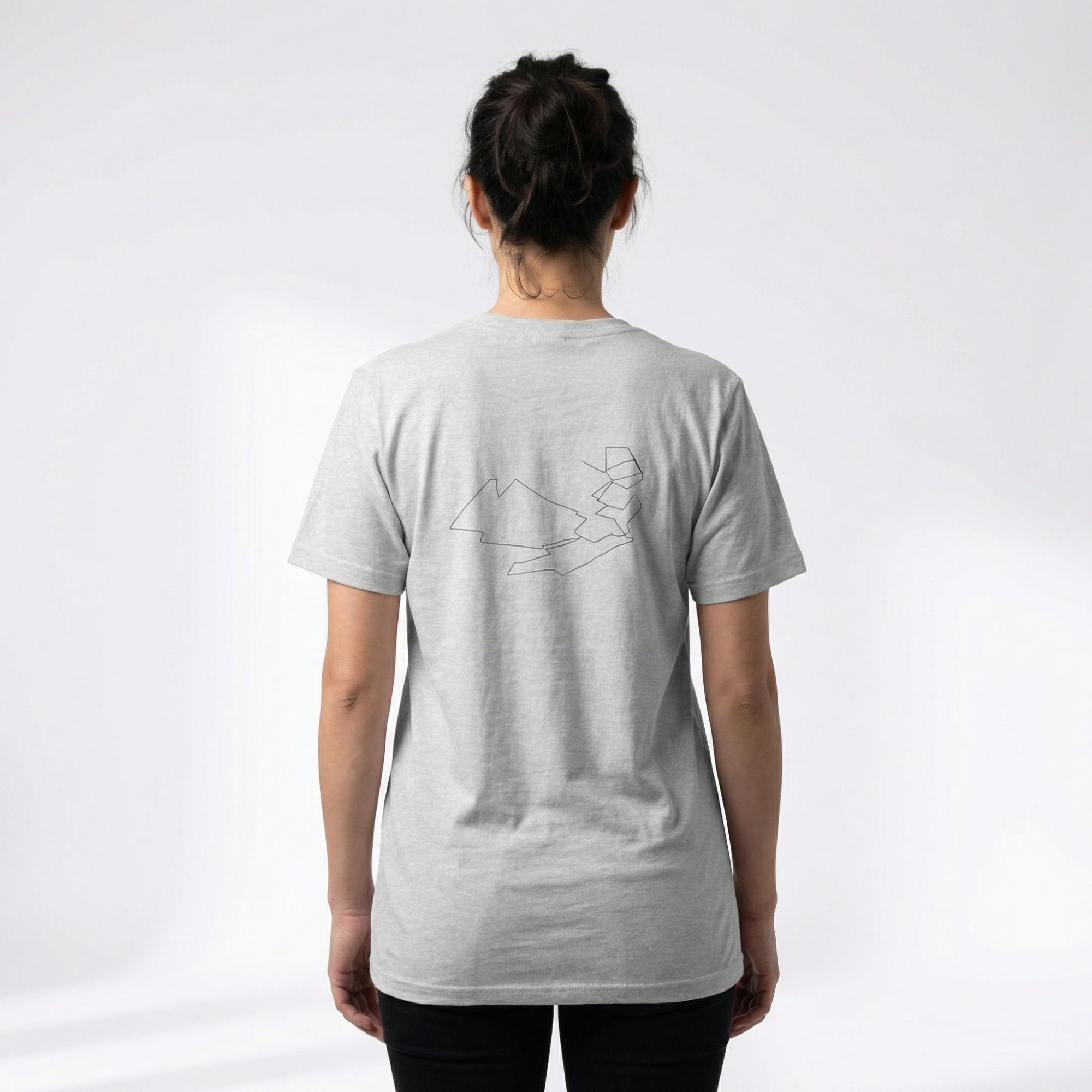 Grey t-shirt with black custom Strava route print art design on the back, worn by a person against a white background