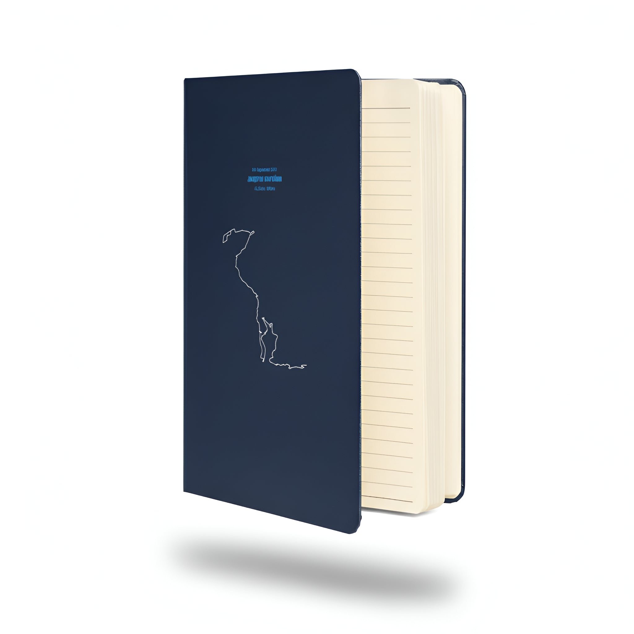 Blue notebook with custom Strava route print art and white interior on a white background