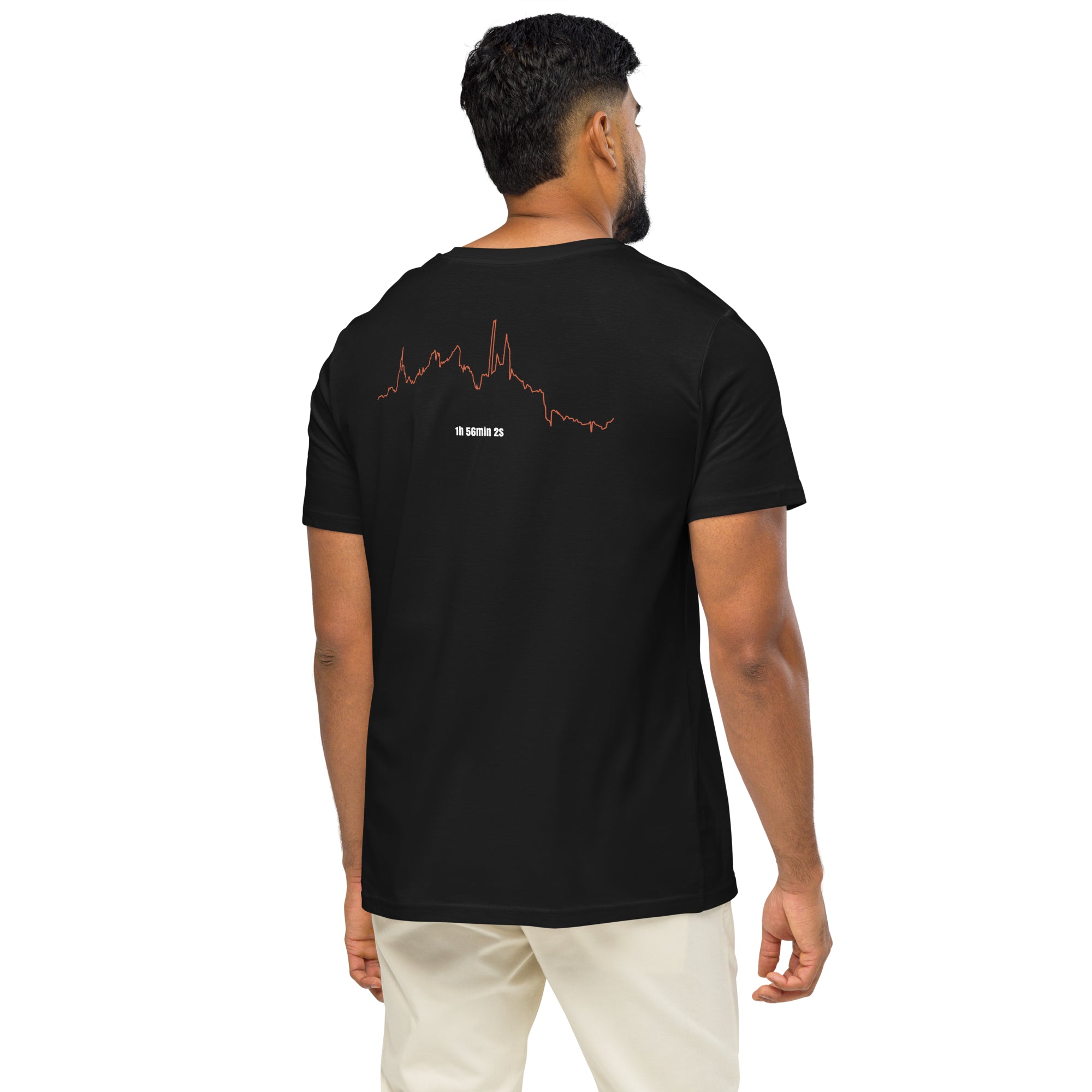 Man wearing a black t-shirt with a custom Strava route print art design on the back, standing against a white background