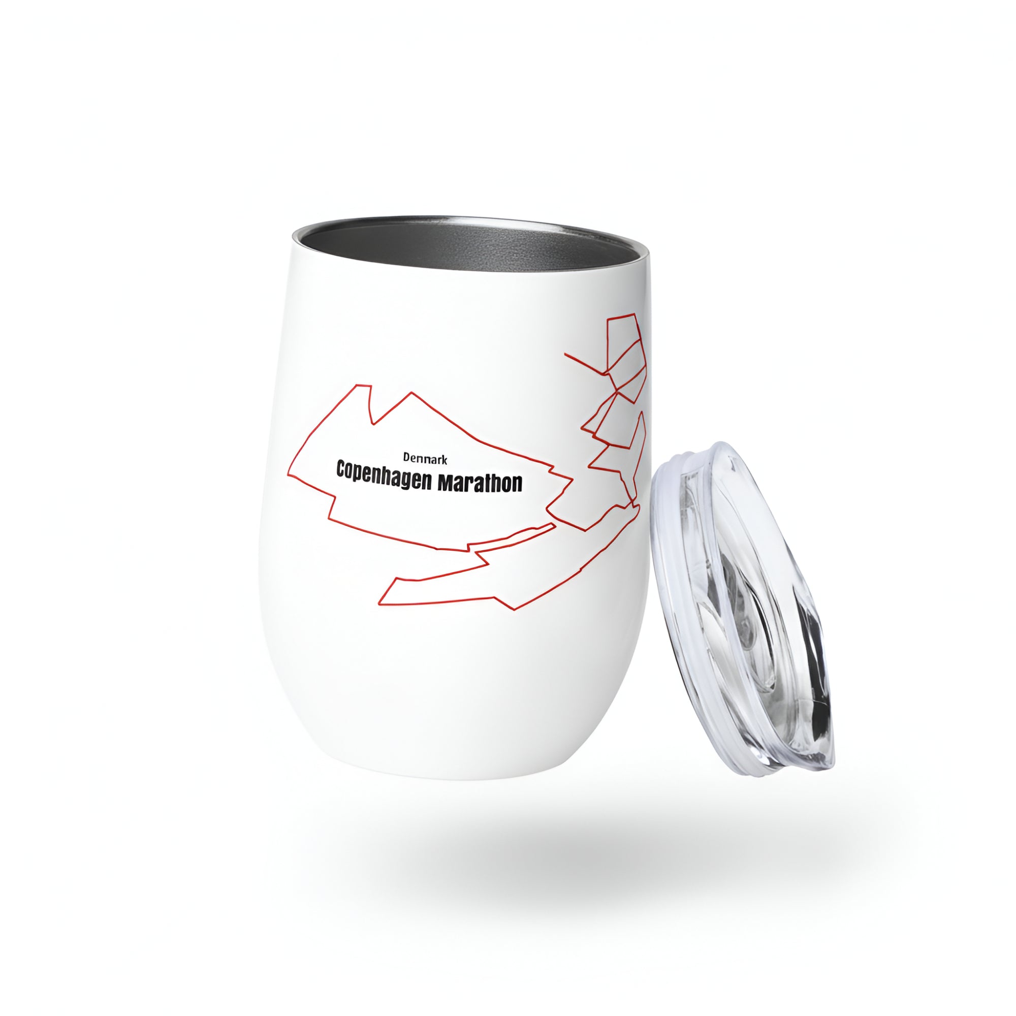 White tumbler with red custom Strava route print art design and black text on a white background