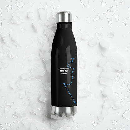 Black water bottle with a custom Strava print art design on a textured white background