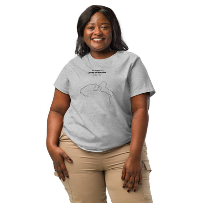 Woman wearing a gray t-shirt with a custom Strava route print design on a white background