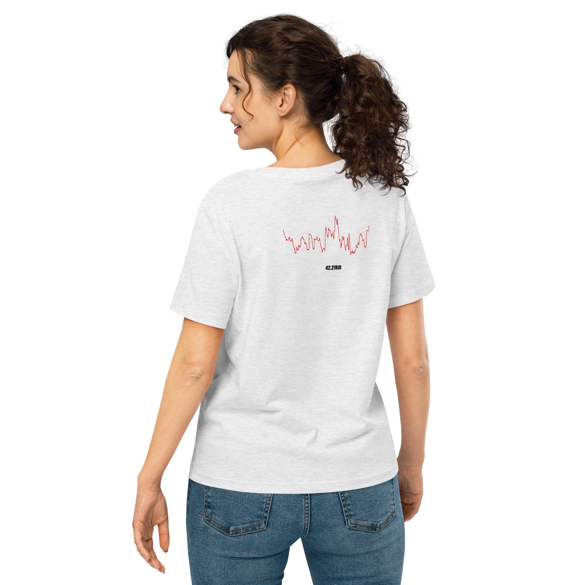 Woman wearing a white t-shirt with a red custom Strava route print on the back, standing against a white background