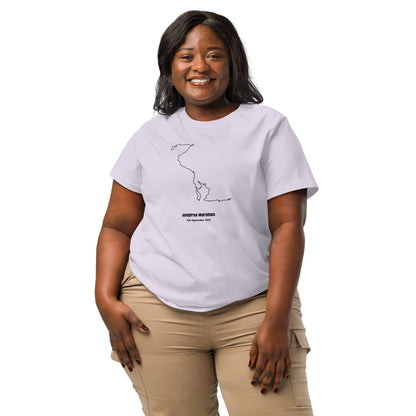 Woman wearing a white t-shirt with a custom Strava route print design on a white background