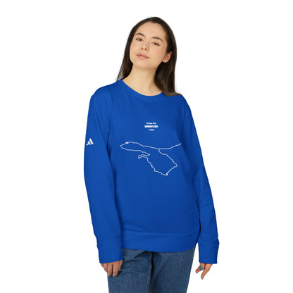 Person wearing a blue long-sleeve shirt with a white custom Strava route print art on a white background