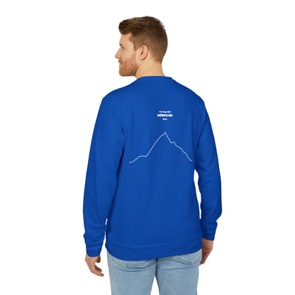 Man wearing a blue long-sleeve shirt with a custom Strava route print art graphic on the back, standing against a white background