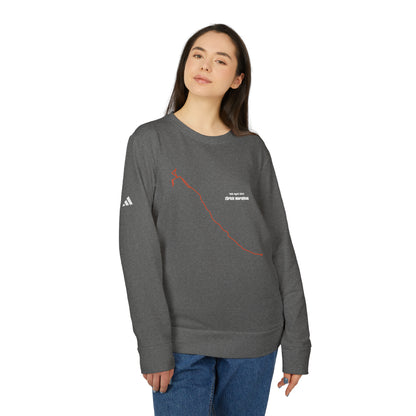 Person wearing a gray sweatshirt with a custom Strava route print art on a white background