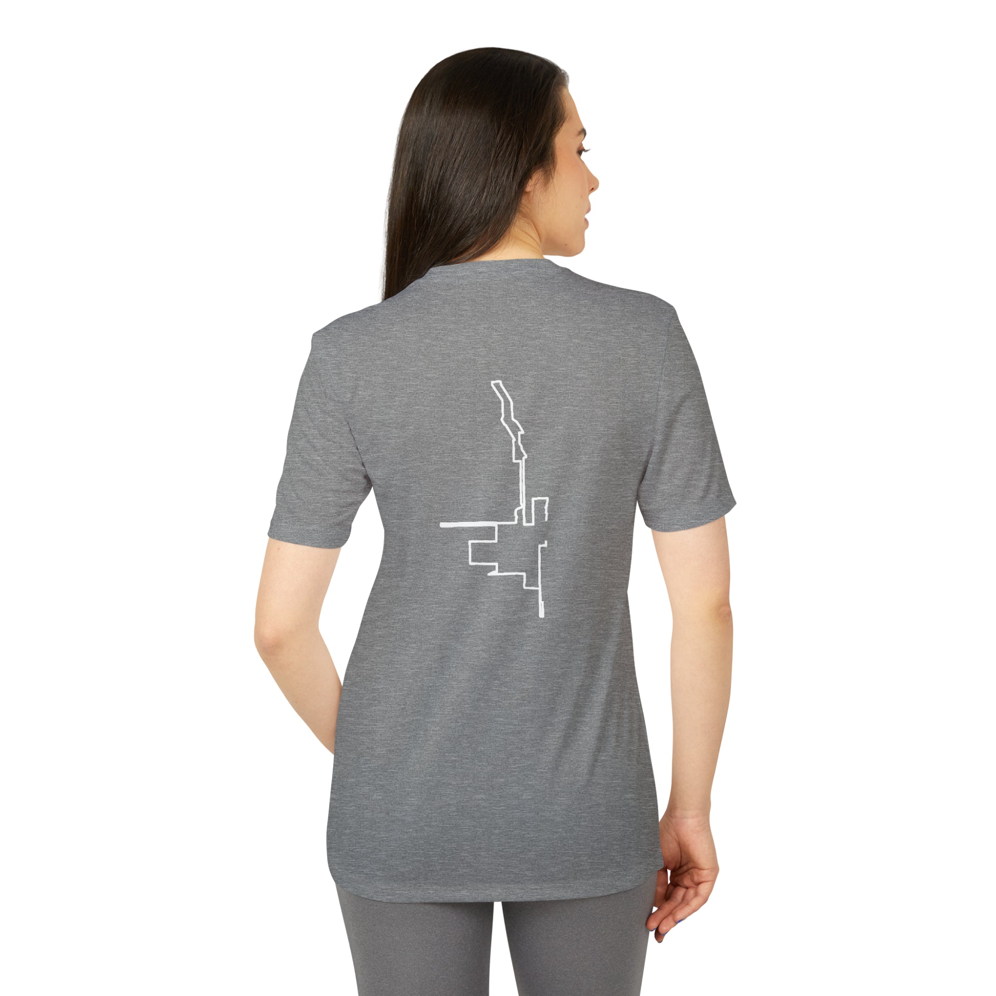 Woman wearing a gray t-shirt with a white custom Strava route print art on the back, standing against a white background