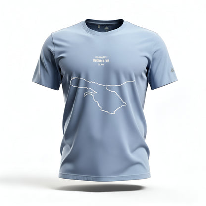 Light blue t-shirt with a custom Strava route print art design and Adidas logo on a white background