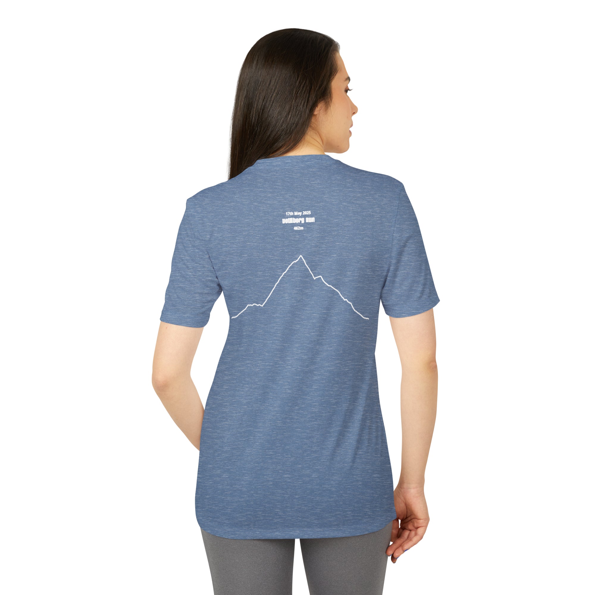 Woman wearing a blue t-shirt with a custom Strava route print art on the back, standing against a white background