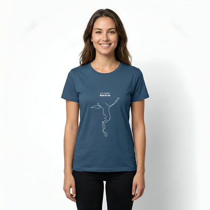 Woman wearing a blue t-shirt with a white custom Strava route print art design on a white background