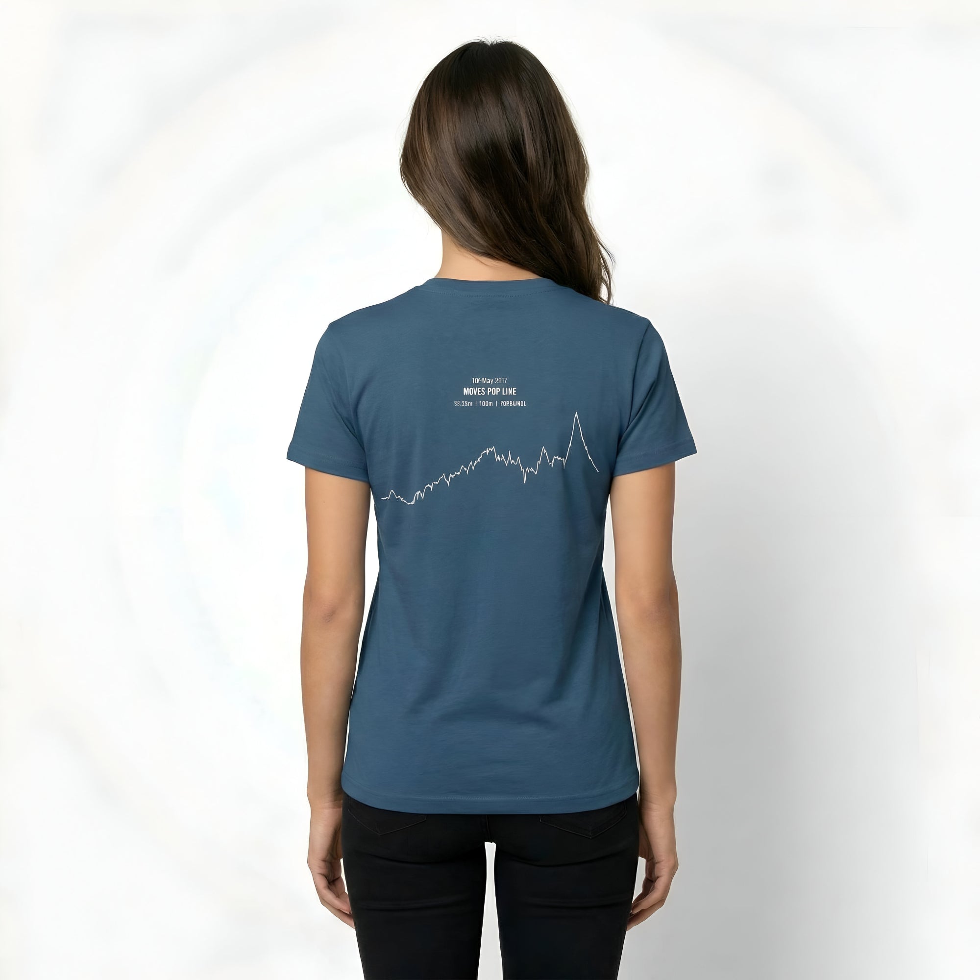 Person wearing a blue t-shirt with custom Strava route print art design on the back against a white background