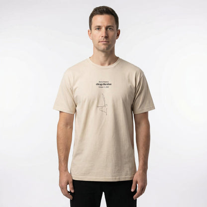 Man wearing a beige t-shirt with text and custom Strava route print art design on a white background