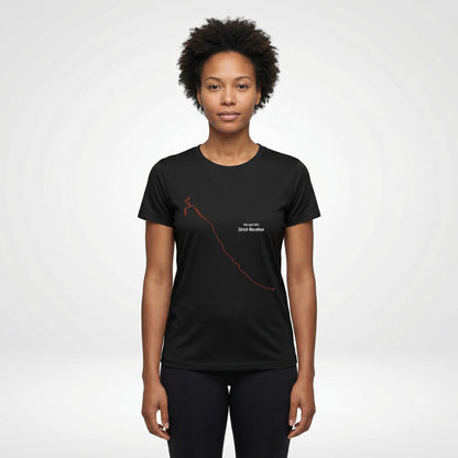 Person wearing a black t-shirt with an orange custom Strava route print art design on a white background