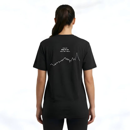 Person wearing a black t-shirt with a white custom Strava route print art on the back against a white background