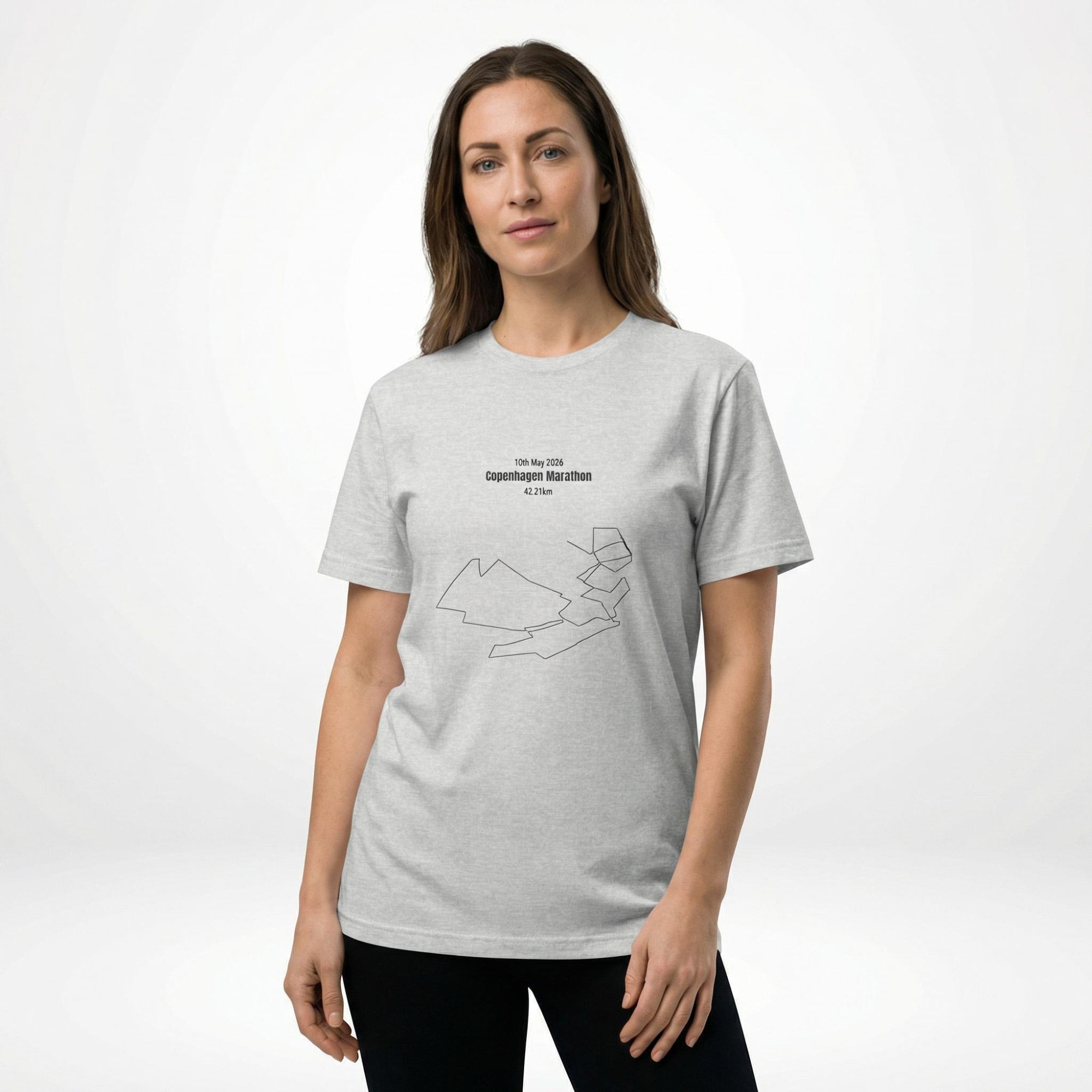 Person wearing a grey t-shirt with a custom Strava route print art design on a white background