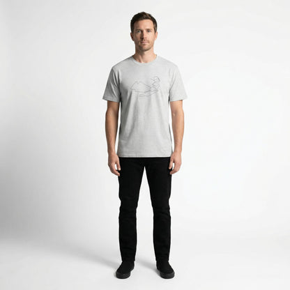 Man wearing a light gray t-shirt with a custom Strava route print art design on a white background