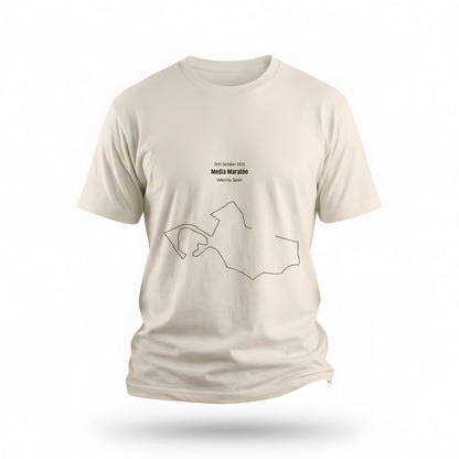 Beige t-shirt with a printed custom Strava route art design on a white background