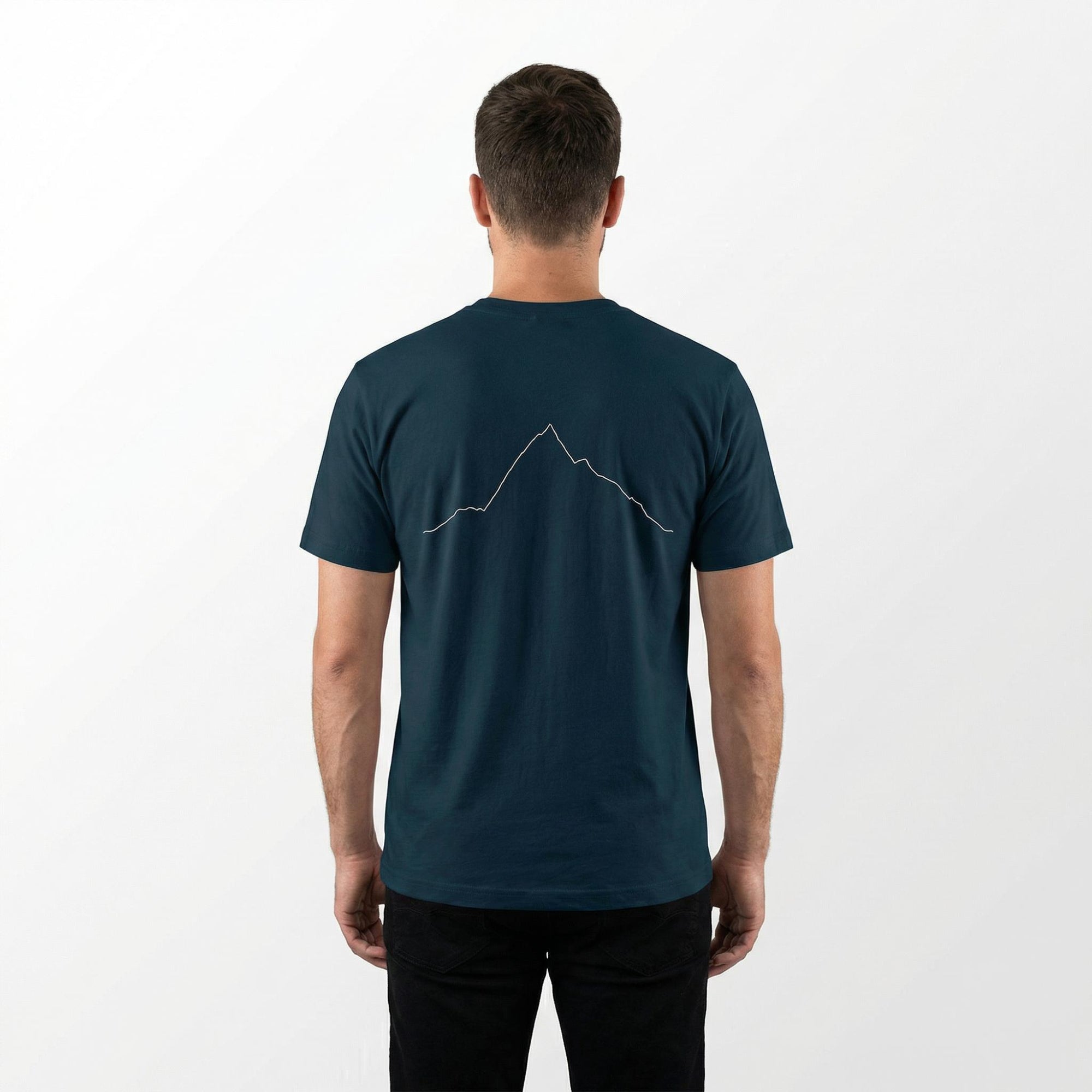 Man wearing a teal t-shirt with a custom Strava route print art design on the back against a white background