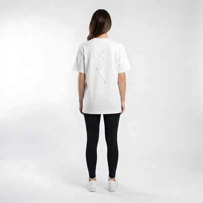 Person wearing a white t-shirt with a custom Strava route print art design on the back against a plain background