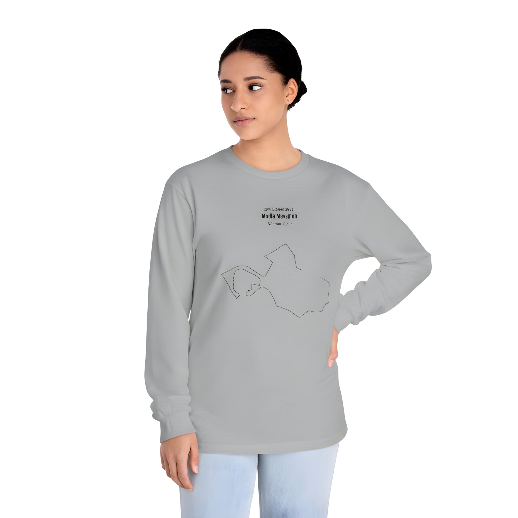 Woman wearing a gray long-sleeve shirt with a custom Strava route print art design and text on a white background