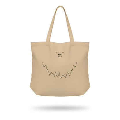 Beige tote bag with a black custom Strava route print art design and text on a white background