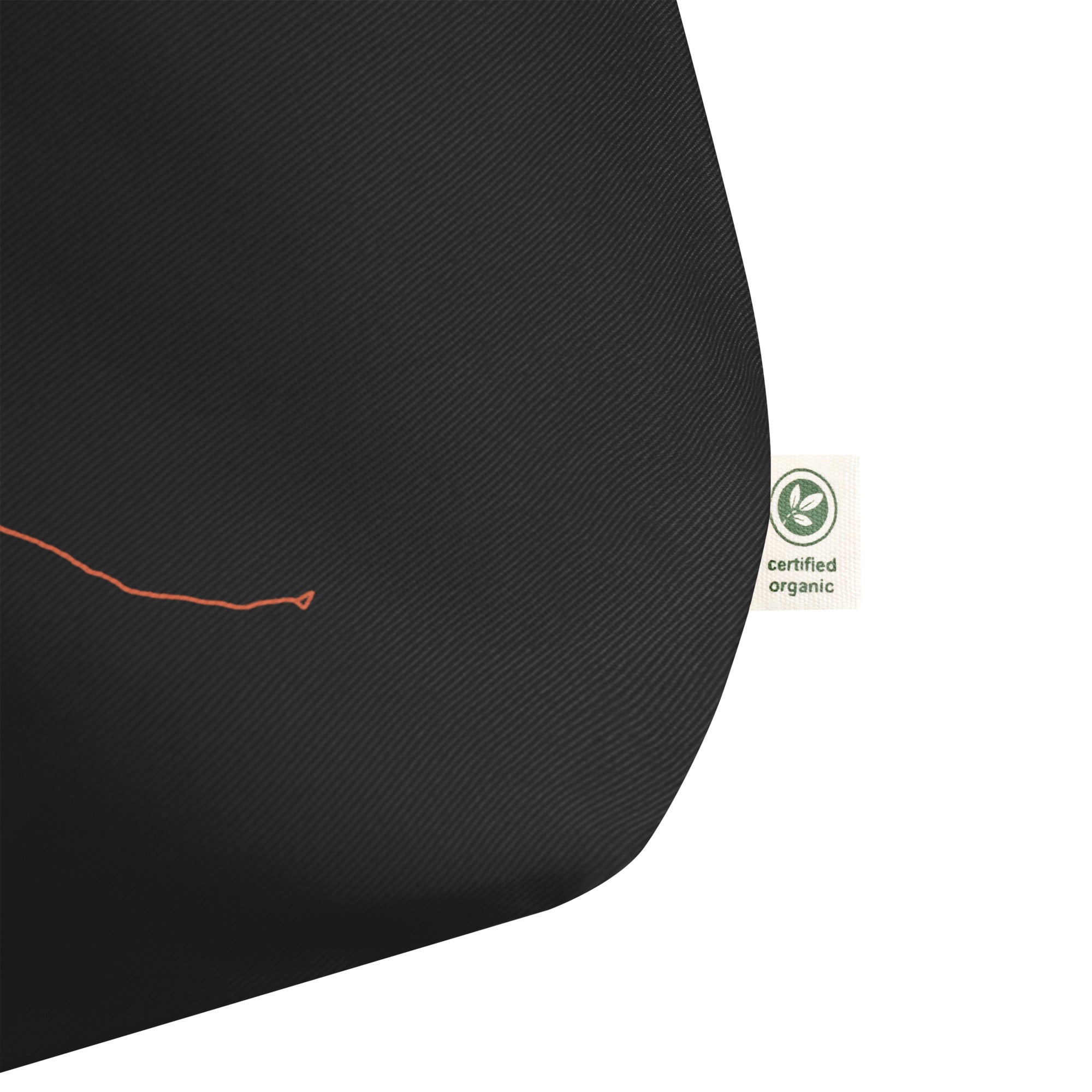 Black product with custom Strava route art design and a certified organic label on a white background