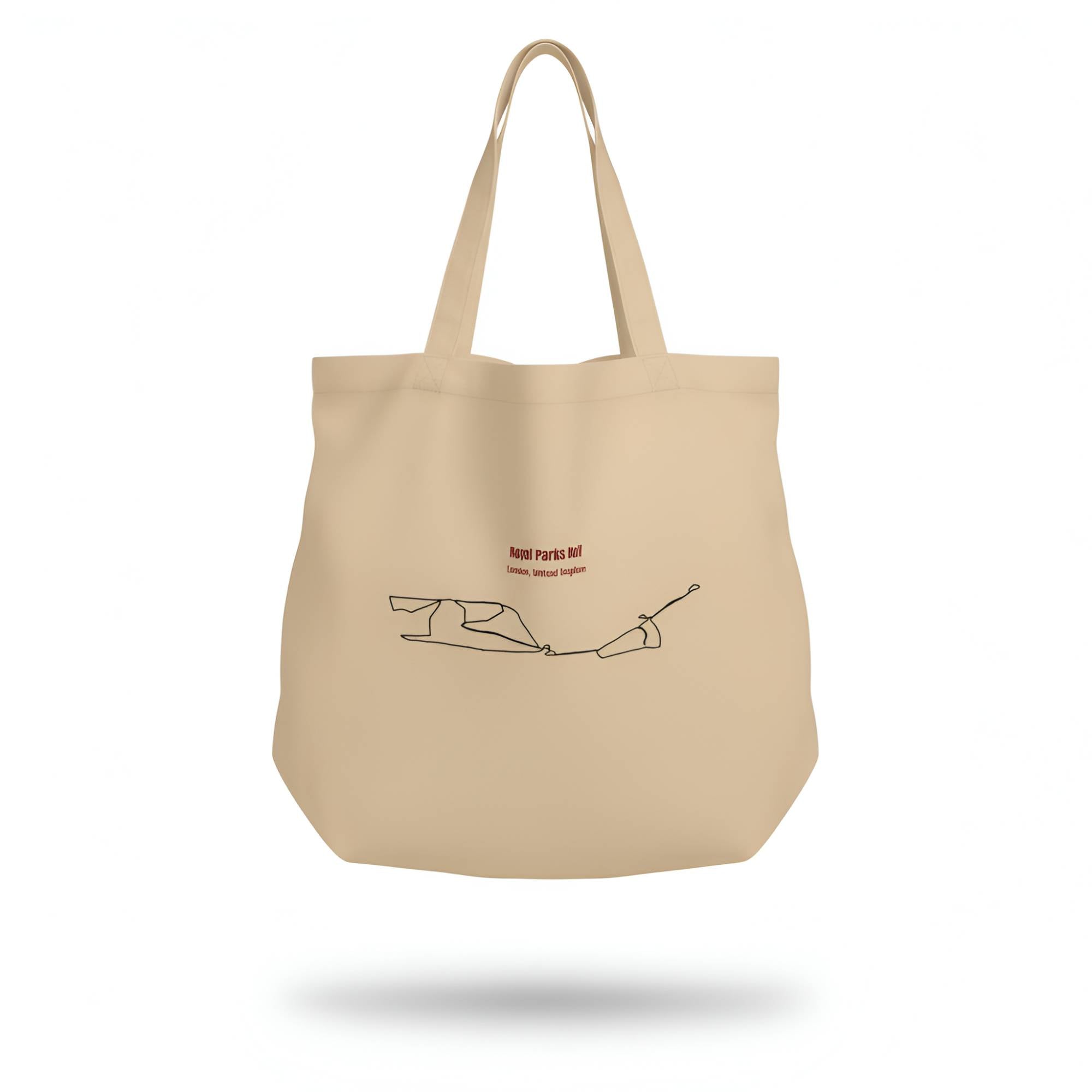 Beige tote bag with a custom Strava route print art design and text on a white background
