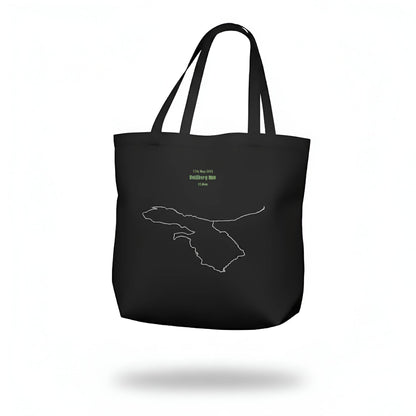 Black tote bag with a white custom Strava route print art design on a white background