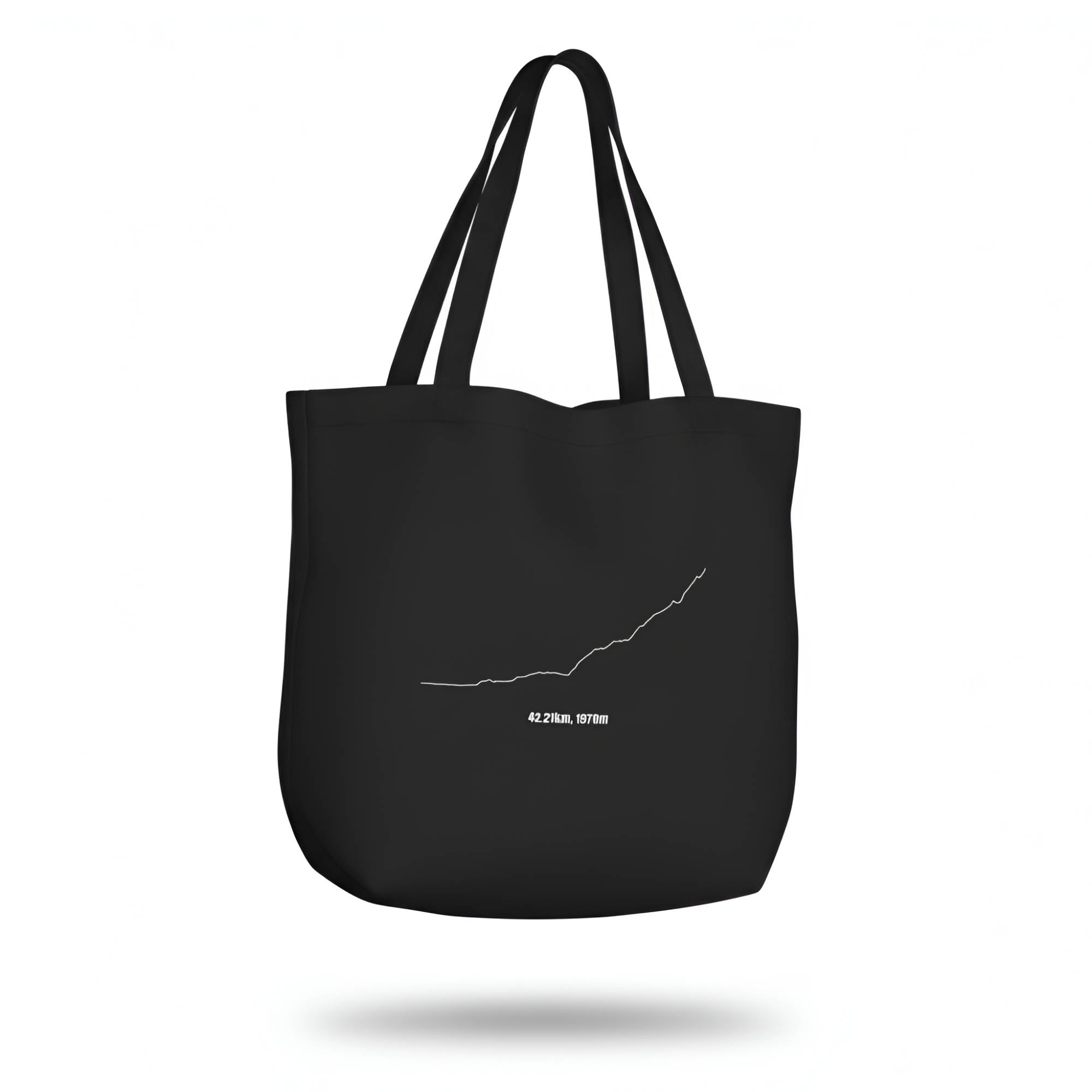 Black tote bag with a white custom Strava route print art design on a white background