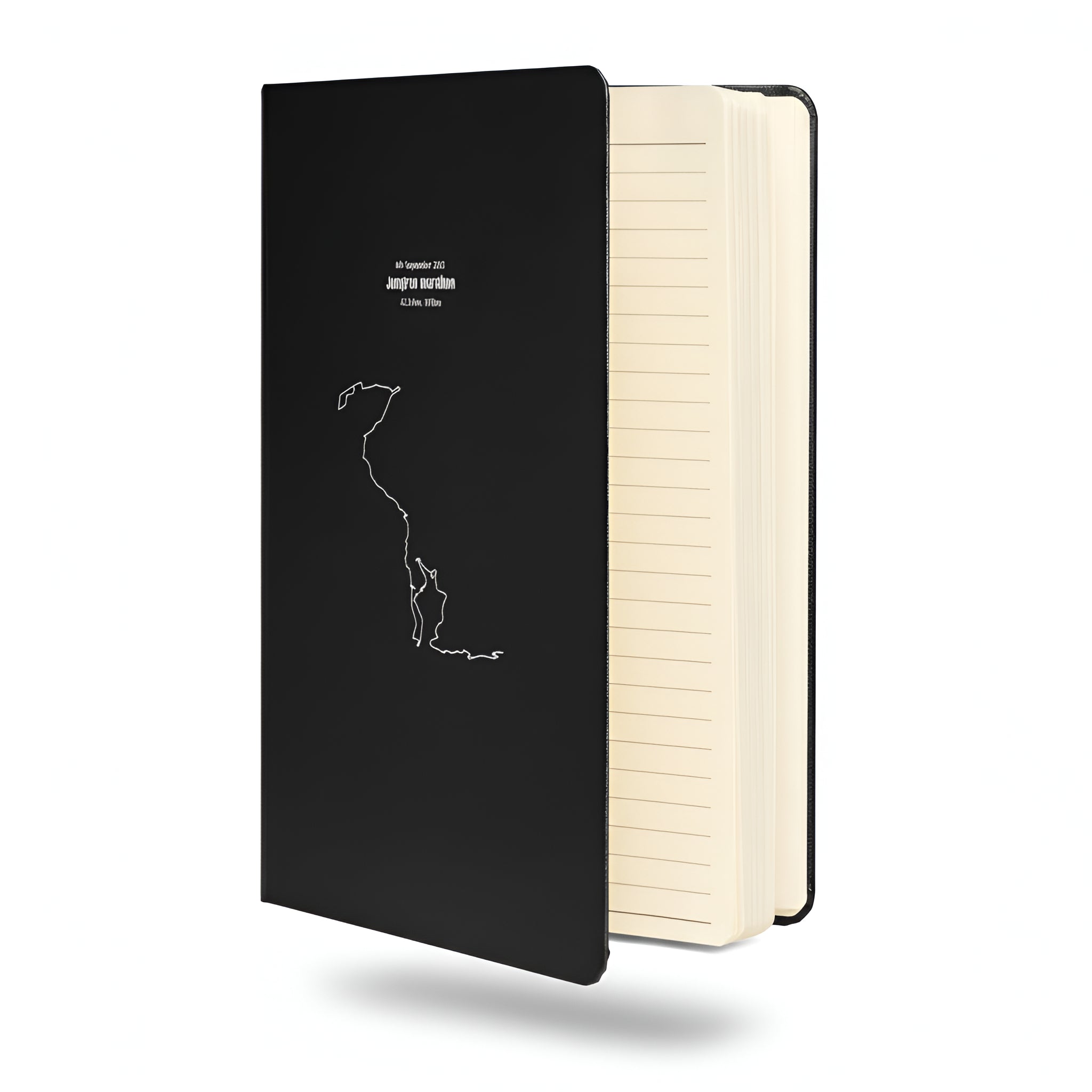 Black notebook with custom Strava route print art design on a white background