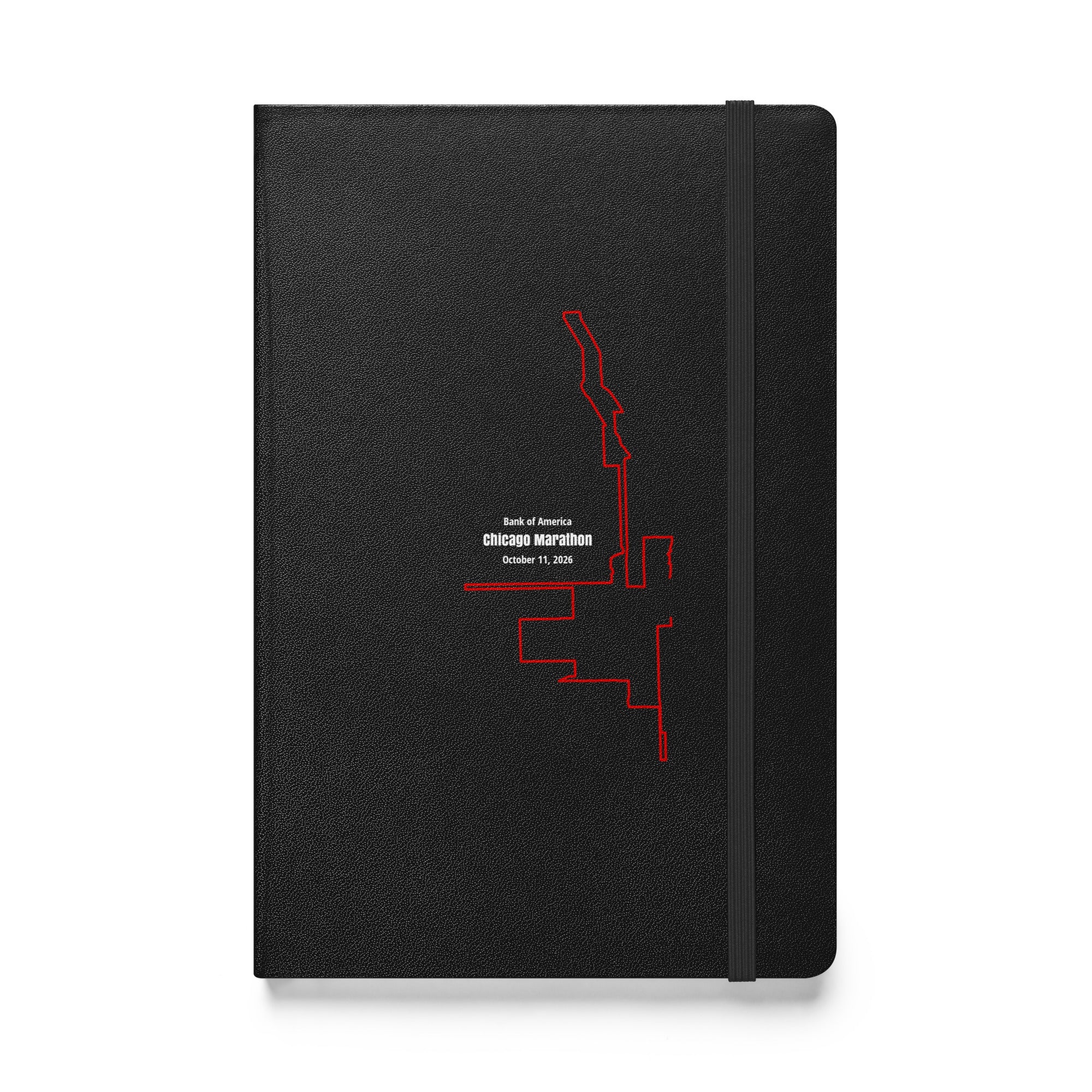 Black notebook with red custom Strava route print art design on a white background
