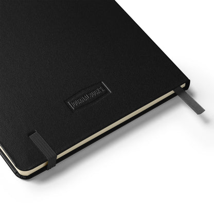 Black notebook with a brand logo on a white background