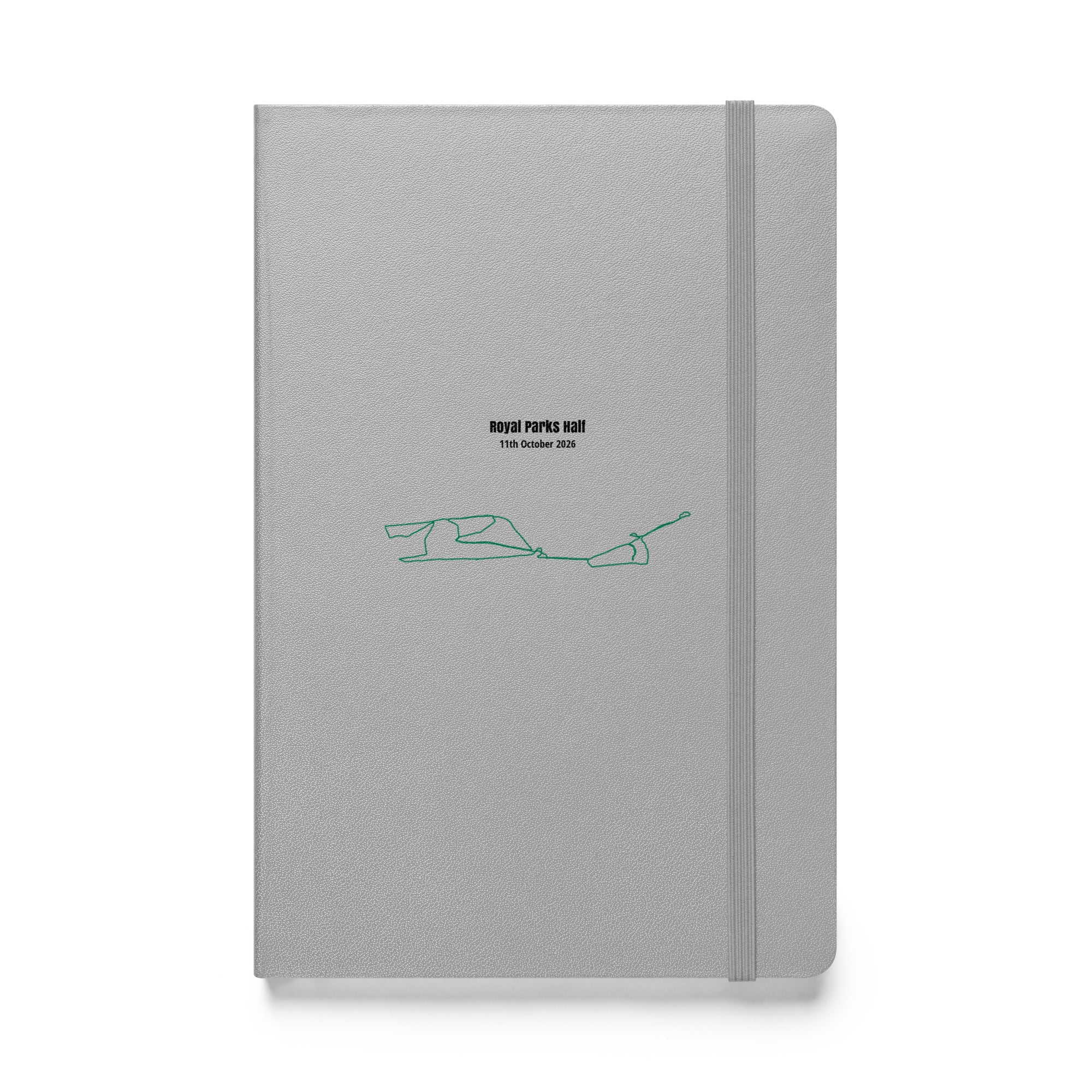 Gray notebook with a green custom Strava route print art design on a white background