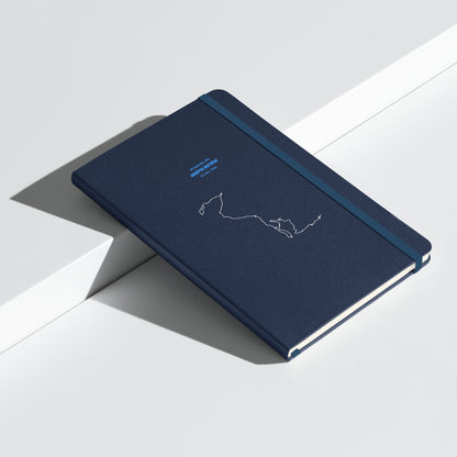 Blue notebook with custom Strava route print art design on a white surface