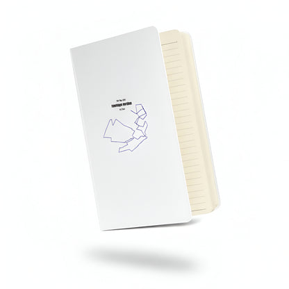 White notebook with custom Strava route print art design on the cover, open to reveal cream-colored pages