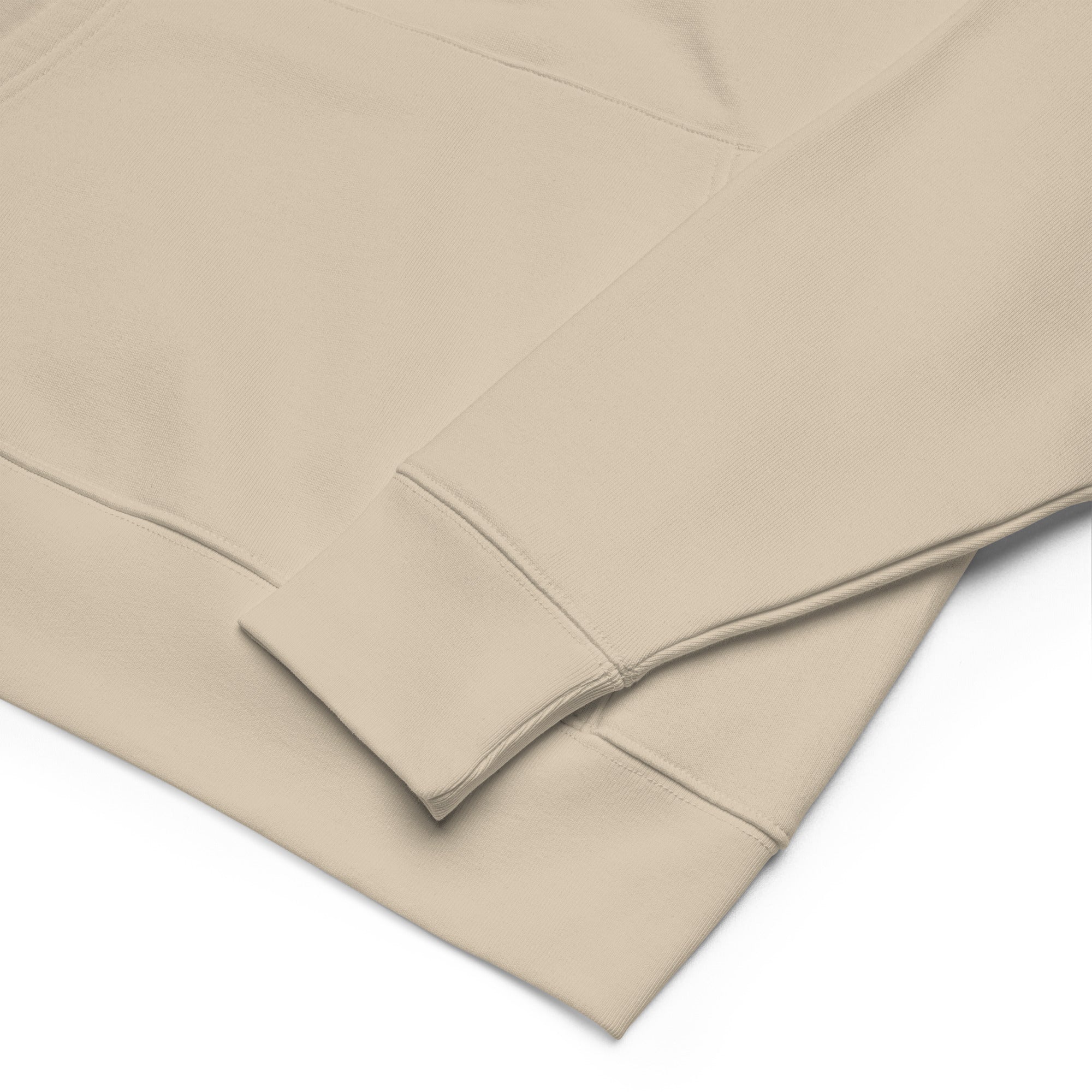 Beige fabric with a subtle texture on a white background