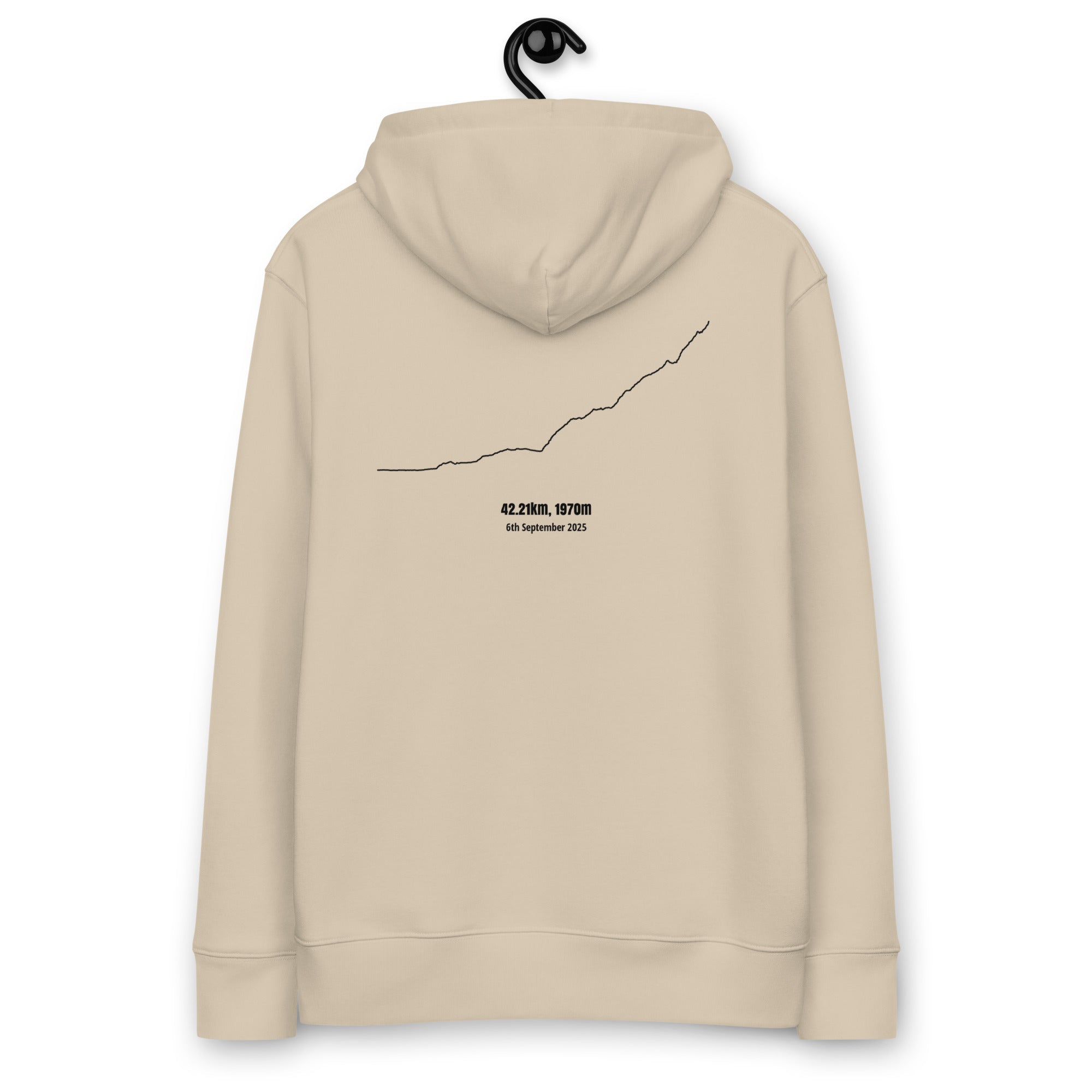 Beige hoodie with a custom Strava route print art design on the back, hanging against a white background