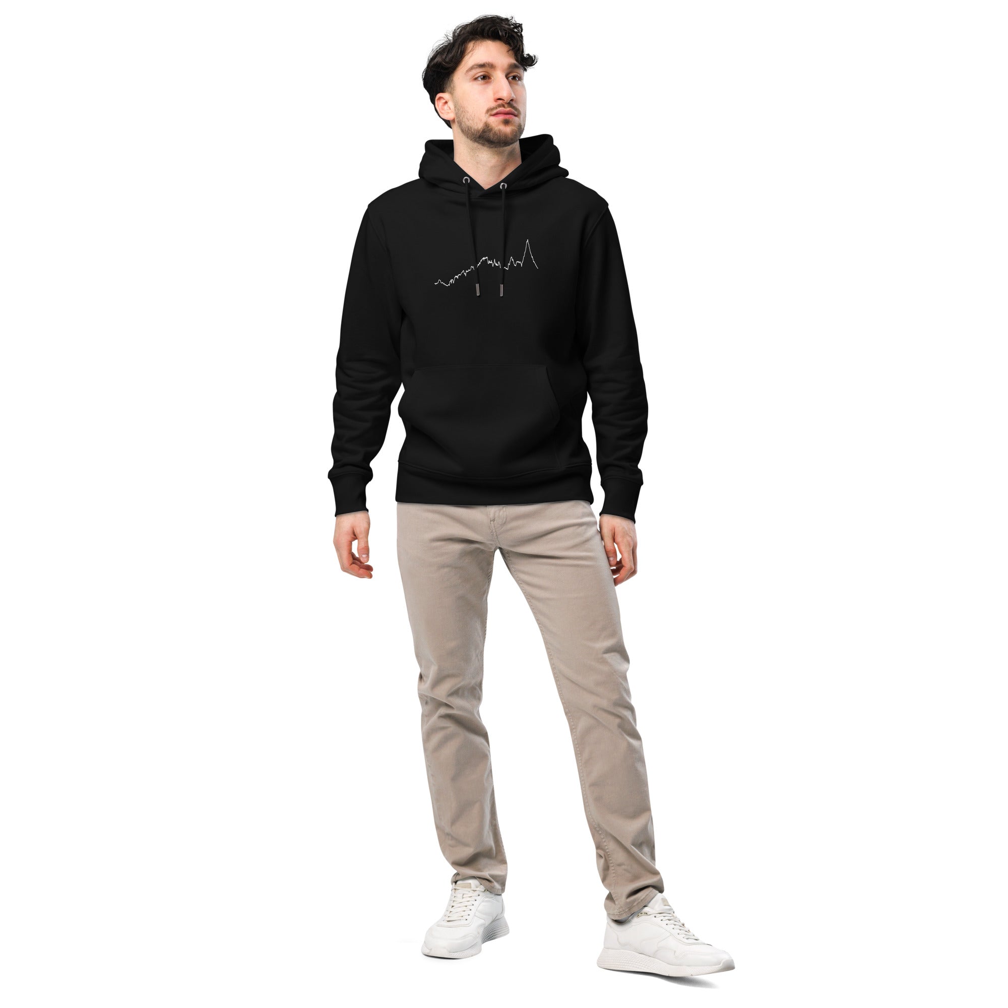 Man wearing a black hoodie with custom Strava route print art and beige pants on a white background