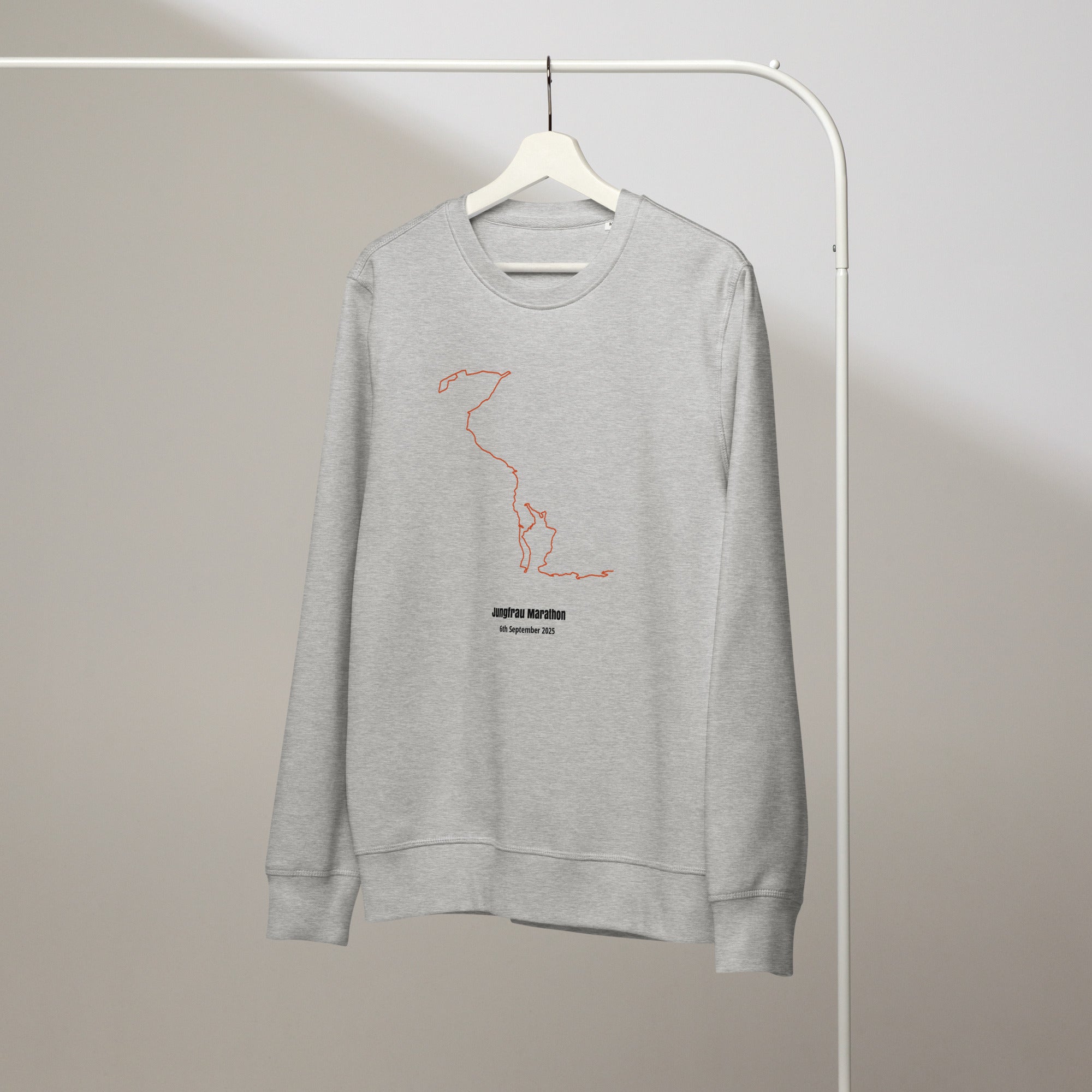 Gray sweatshirt with custom Strava route print art design on a hanger against a plain background