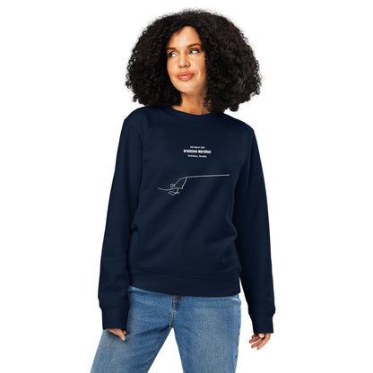 Woman wearing a navy blue sweatshirt with custom Strava route print art design on a white background